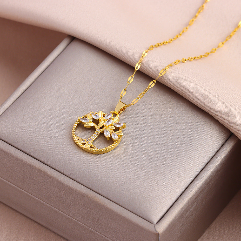 Colgante retro informal de árbol de la vida con incrustaciones de cobre y circonitas bañado en oro