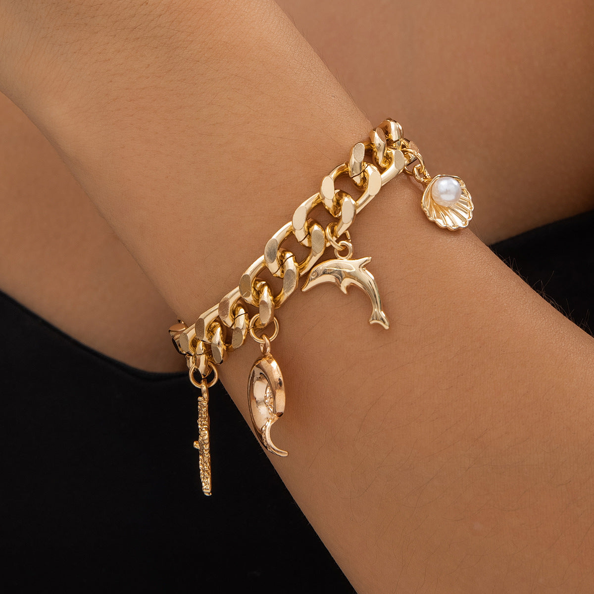 Conjunto de gargantilla y pulsera con borlas estilo bohemio chic con ambiente oceánico